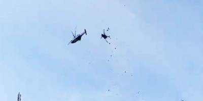 Du helîkopter li hewayê li hev qelibîn: 10 mirî